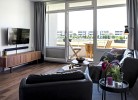 Wohnzimmer mit Balkon