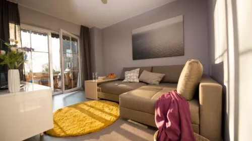 01-ferienwohnung_fehmarn_kleiner_sundblick_am_meer_wohnzimmer 01-ferienwohnung_fehmarn_kleiner_sundblick_am_meer_wohnzimmer