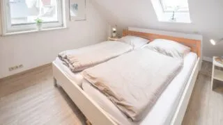 03-ferienwohnung_fehmarn_captains_suite_schlafzimmer 03-ferienwohnung_fehmarn_captains_suite_schlafzimmer